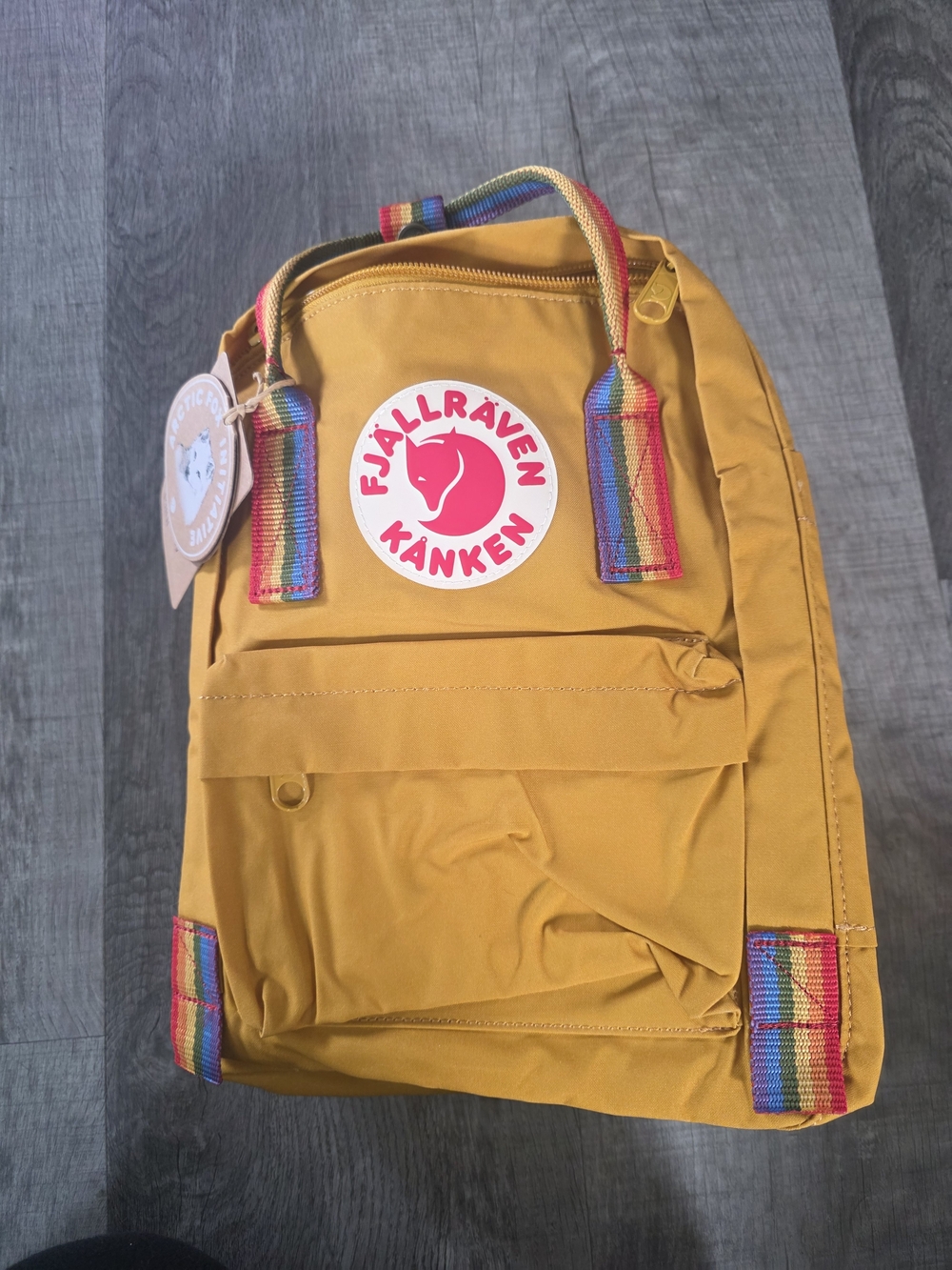 Kånken Mustard Yellow Backpack with Rainbow Accents